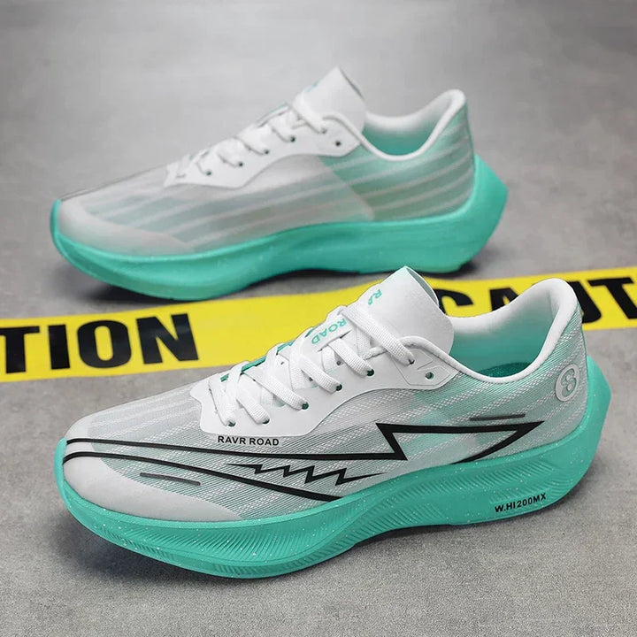A pair of white athletic shoes with lightweight construction, teal shock-absorbing soles, and black zigzag designs are placed on a gray floor behind yellow caution tape.