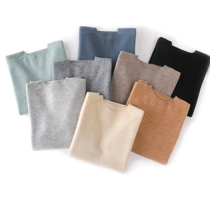 Rovelli soft knit sweaters in assorted colors folded on a white background