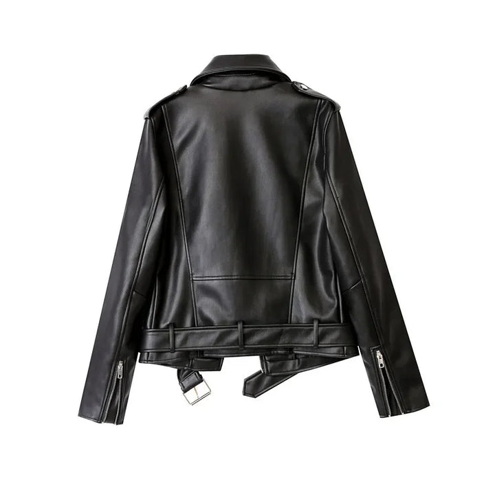 A black faux leather biker jacket shown from the back, featuring a wide collar, shoulder epaulets, silver zippers on the sleeves, and an adjustable waist belt with a large silver buckle.
