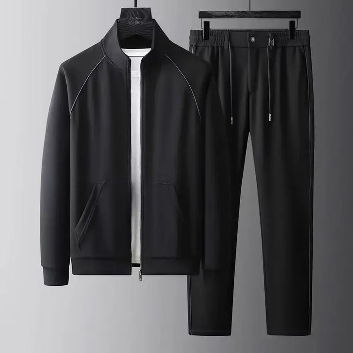 Rovelli men's black tracksuit set with zip-up jacket and drawstring pants on hangers