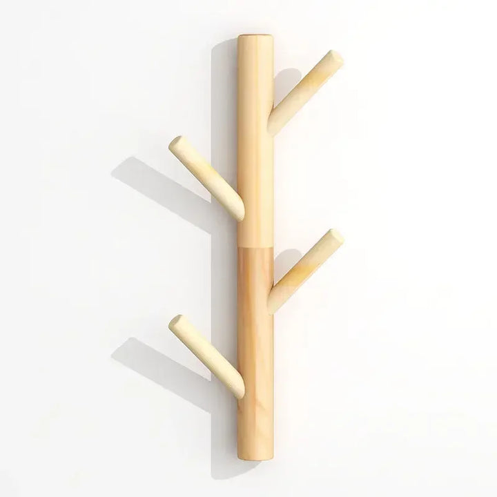 Rovelli minimalist wooden wall hook rack shaped like a tree branch on a white background