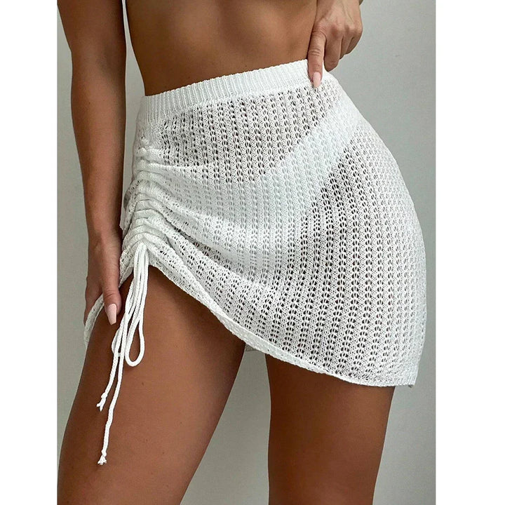 Rovelli white crochet knit mini skirt with side drawstring detail on model