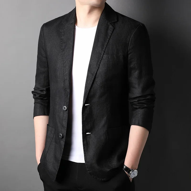 Man wearing black blazer over white shirt, Rovelli modern menswear fashion