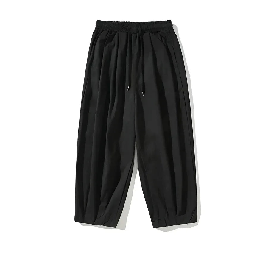 Rovelli black wide-leg drawstring pants with elastic waistband on white background