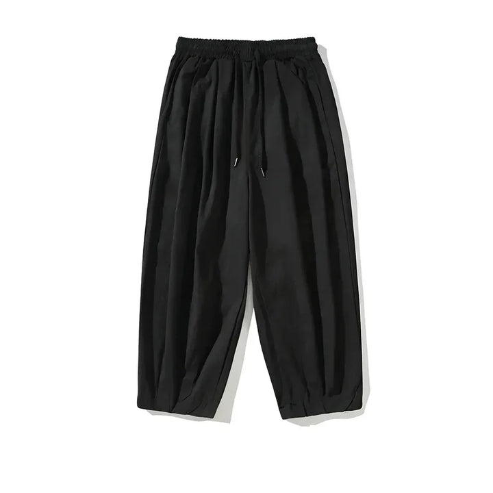 Rovelli black wide-leg drawstring pants with elastic waistband on white background