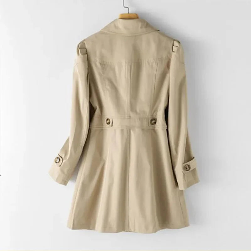 Rovelli beige trench coat with button details hanging on a hanger, back view