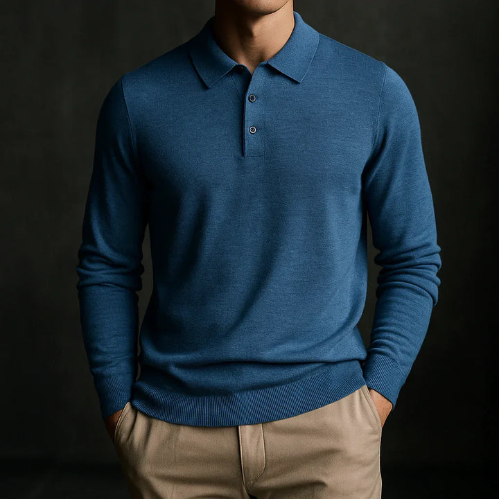 Rovelli blue merino wool polo sweater on man with tan pants, studio background