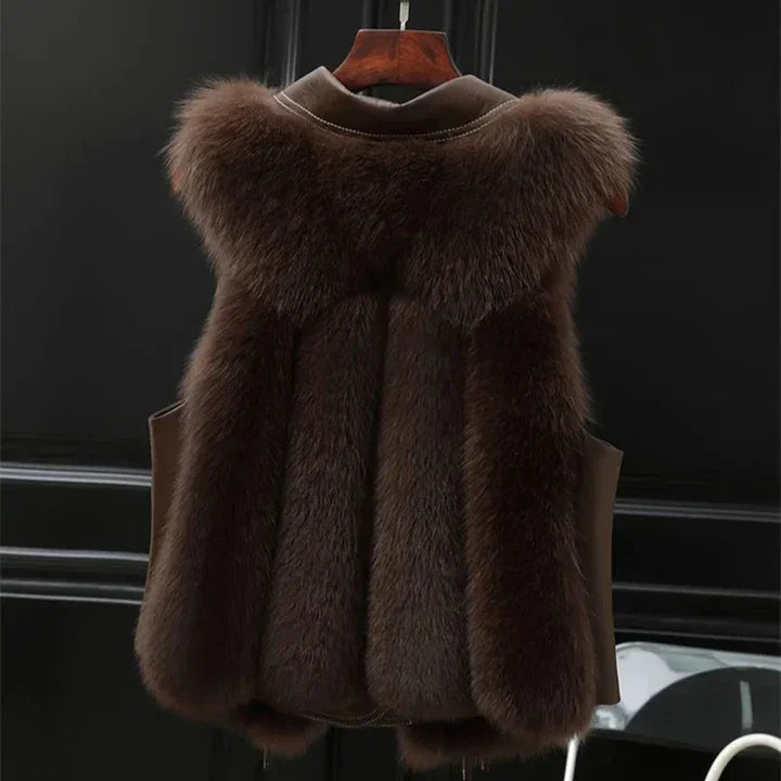 Rovelli luxury brown fur vest on hanger in stylish interior setting