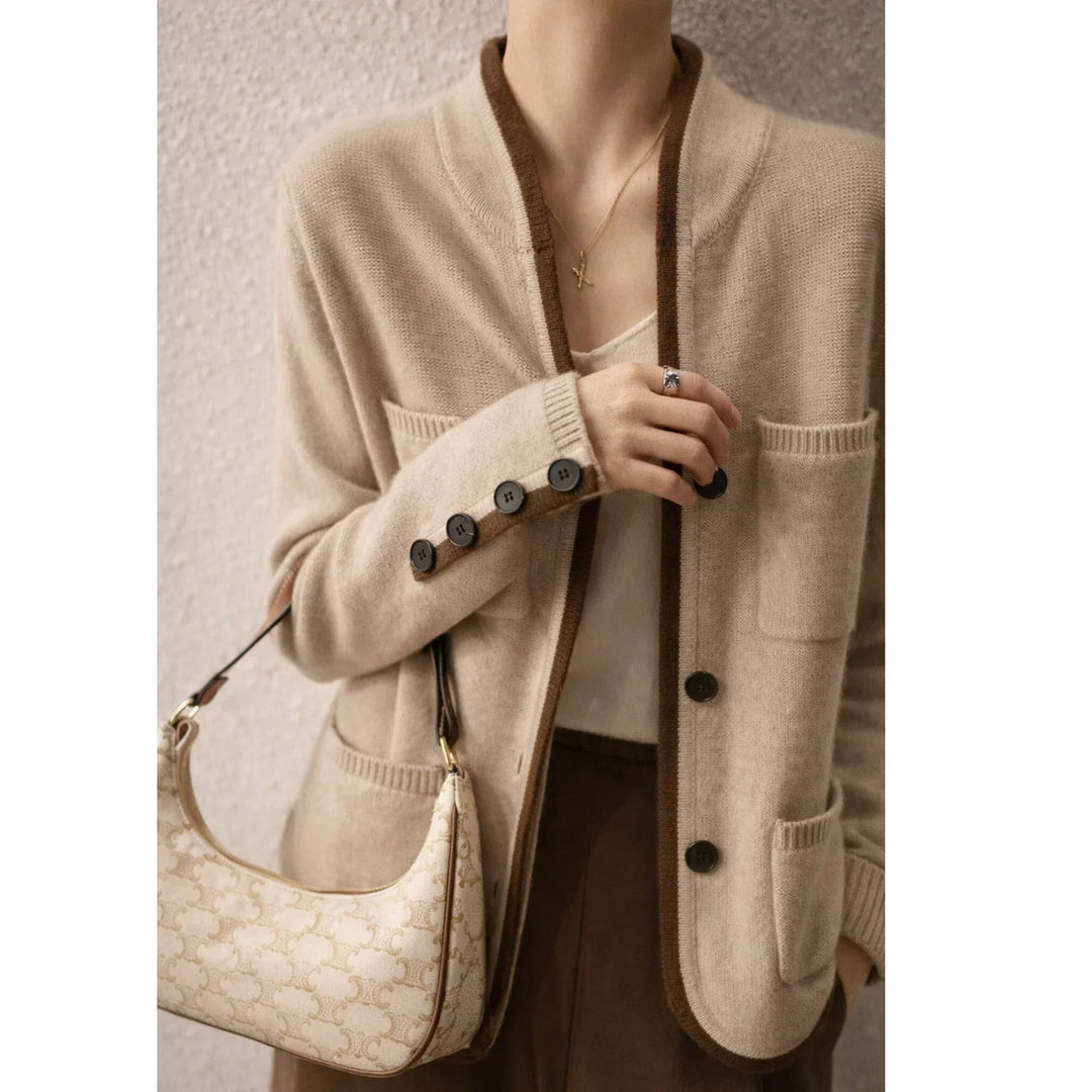 Rovelli beige knit cardigan with brown trim, front pockets, black buttons, designer patterned shoulder bag