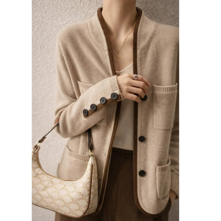 Rovelli beige knit cardigan with brown trim, front pockets, black buttons, designer patterned shoulder bag