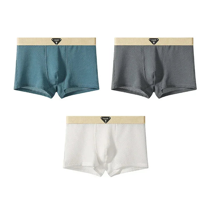 Rovelli men’s boxer briefs in blue, gray, and white with beige waistbands, set of three
