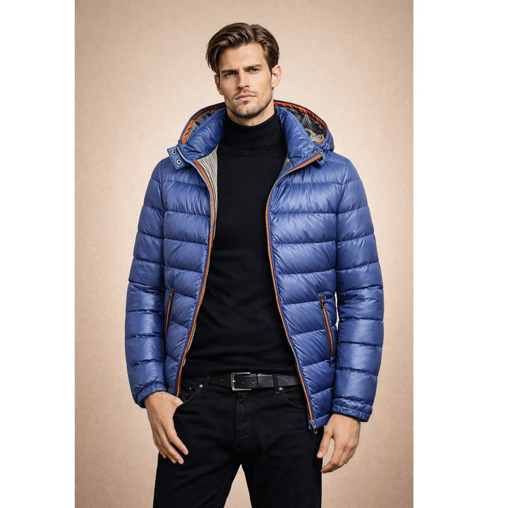 Man wearing blue puffer jacket from Rovelli, black turtleneck and black pants