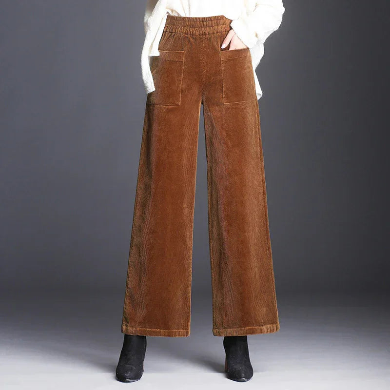 Rovelli khaki wide leg corduroy pants with front pockets, styled with white sweater