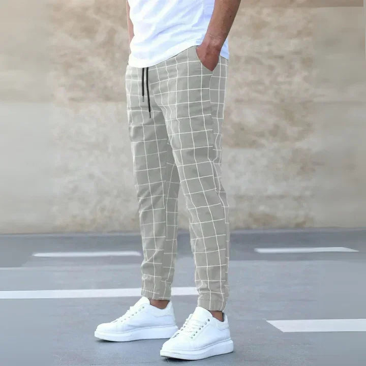 Rovelli beige windowpane check jogger pants with drawstring, styled with white sneakers