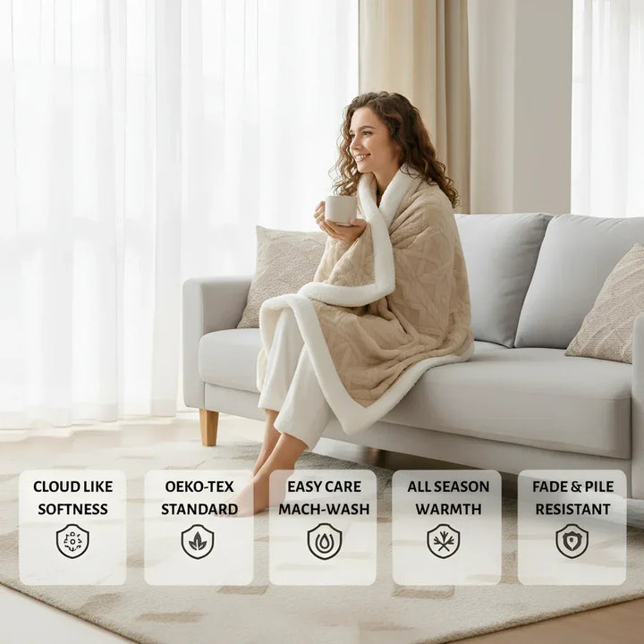 Woman wrapped in Rovelli sherpa blanket on sofa, with icons showing softness, easy care, and warmth