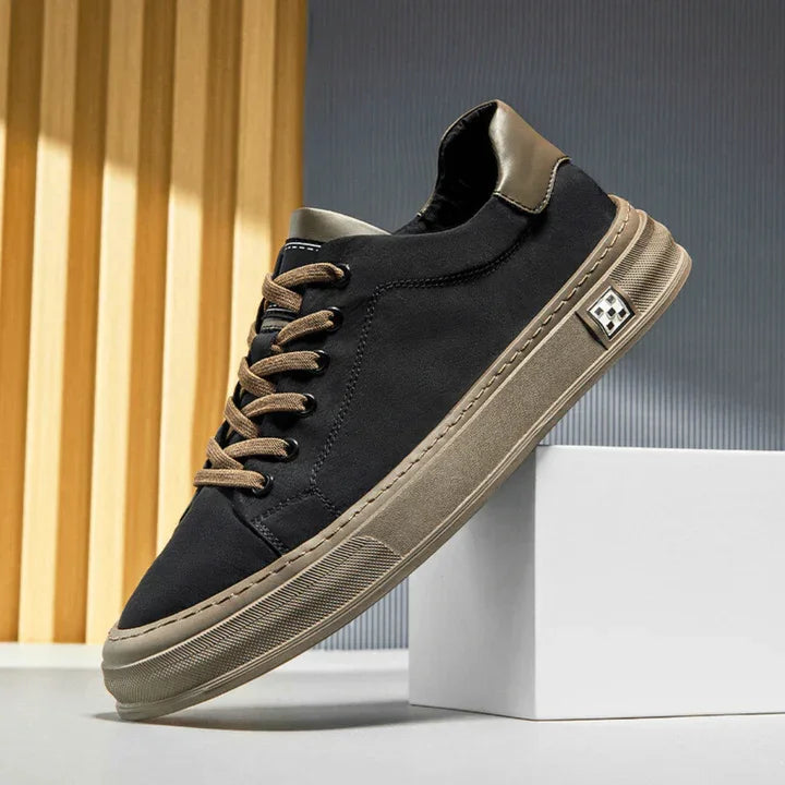 Rovelli Ariston sneaker in black with beige sole, stylish men's casual shoe on display.
