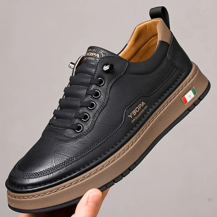 Rovelli black leather sneaker with tan sole, Italian flag detail, side logo, and tan interior