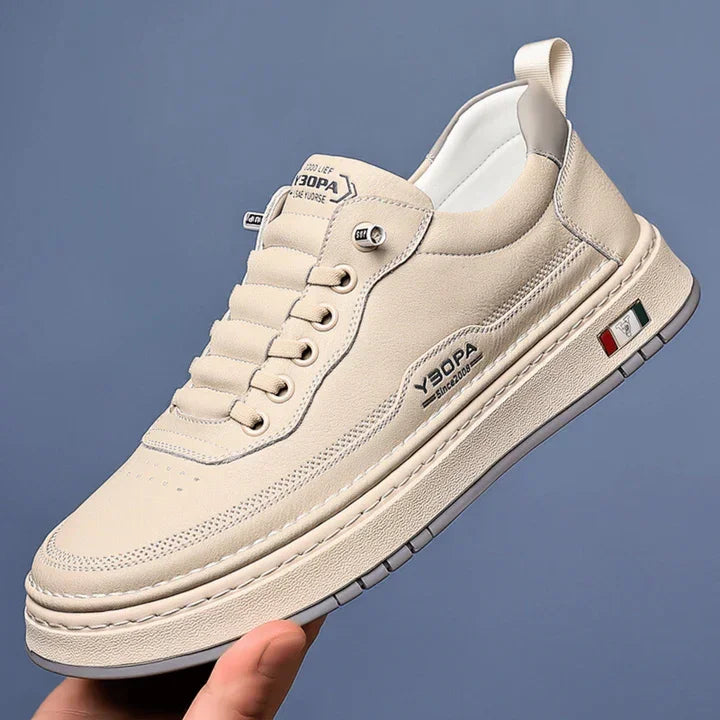 Beige Rovelli sneaker with textured sole, side branding, and Italian flag detail