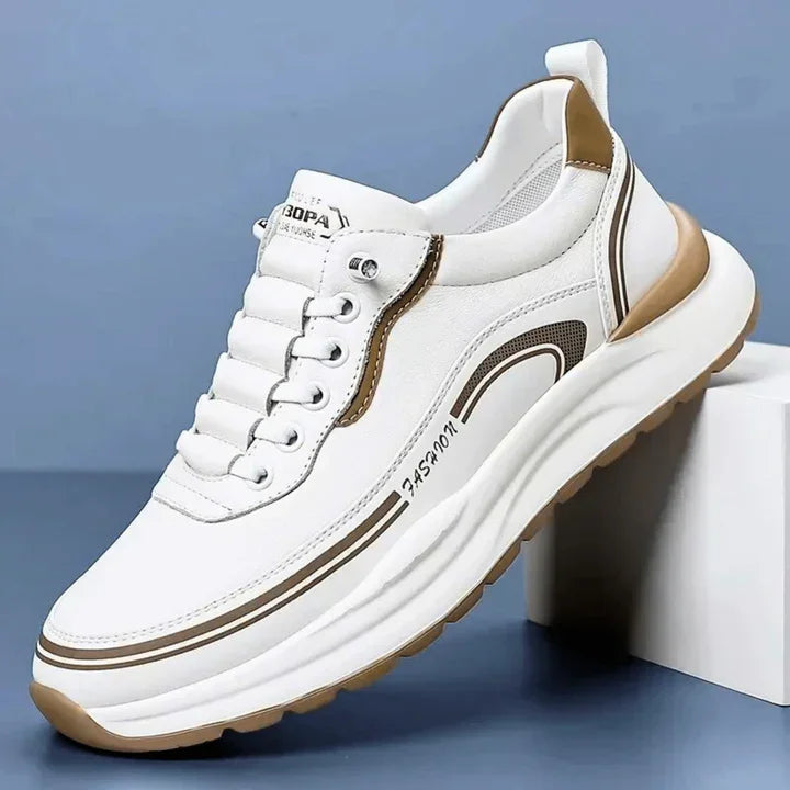 Rovelli white sneaker with beige accents and chunky sole on blue background