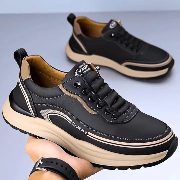 Rovelli Brixton sneaker in black with beige accents, thick sole, and modern casual design