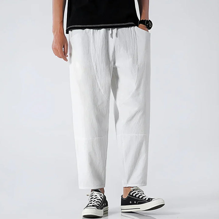 Rovelli relaxed fit white cropped pants with drawstring waist and black sneakers